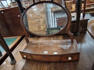 Lot 1030 - A late georgian mahogany swing mirror and a...