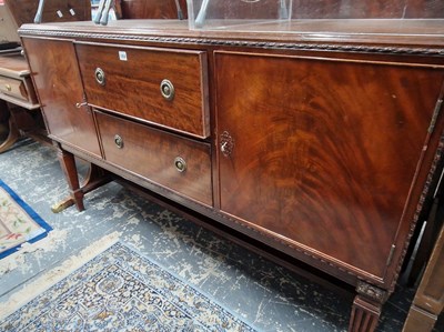 Lot 1058 - A mahogany sideboard by Shirer & Maddon. W 152...