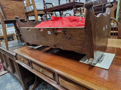 Lot 1059 - An 18th century rocking cradle.