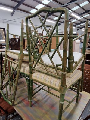 Lot 1081 - A set of four Georgian style side chairs with...