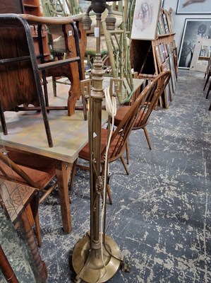 Lot 1083 - An Edwardian brass standard lamp.