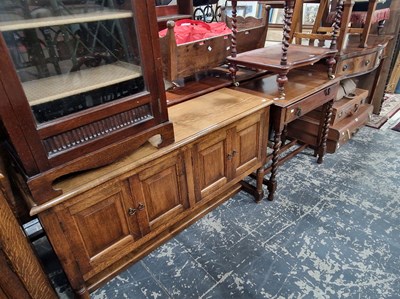 Lot 1070 - An Edwardian mahogany music cabinet, an oak...