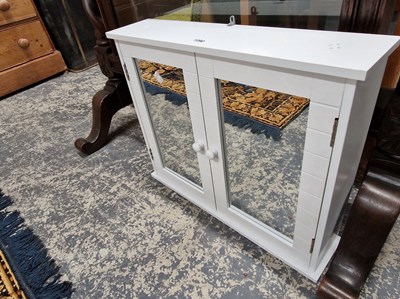 Lot 1090 - A mirrored door small cabinet 56 x 13 x 46 cm...