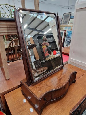 Lot 1111 - A Georgian dressing table mirror.