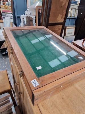 Lot 1119 - A counter top display cabinet.