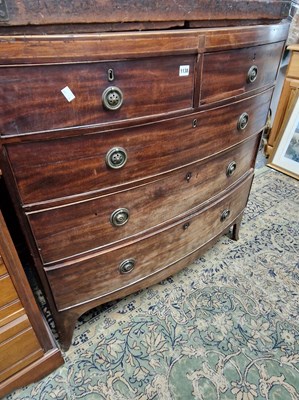 Lot 1138 - A late Georgian mahogany chest of two short...