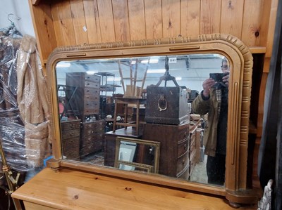 Lot 1141 - A late Victorian gilt framed overmantle mirror.