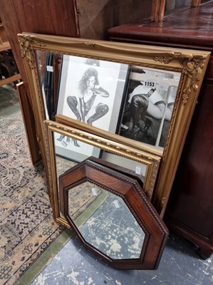 Lot 1153 - An antique oak framed octagonal mirror and two...