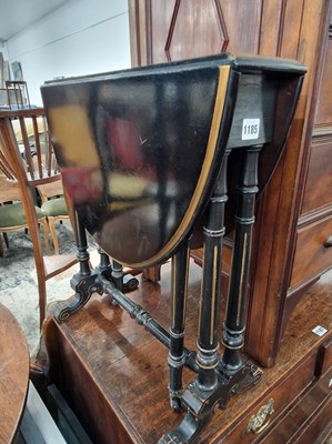 Lot 1185 - A Late Victorian ebonised sutherland table.