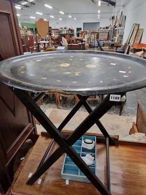Lot 1189 - An antique papier mache oval tray on a later...