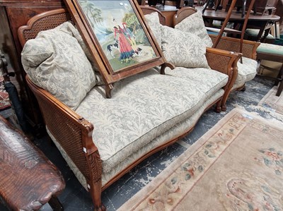 Lot 1194 - An early 20th century bergere sette and...