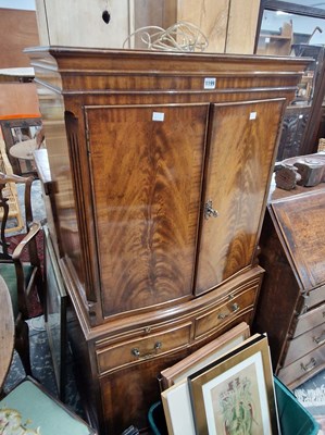 Lot 1199 - A vintage Georgian mahogany style small tall...