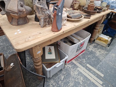 Lot 2153 - A large antique and later pine kitchen table....