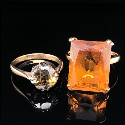 Lot 77 - A large gem set cocktail type orange gem set...