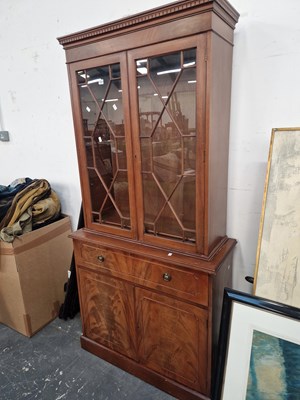 Lot 1231 - An antique style mahogany display bookcase...