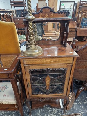 Lot 1240 - An edwardian rosewood and inlaid music cabinet.