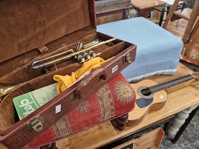 Lot 1245 - A selmer trumpet and a small guitar.