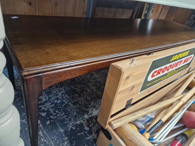 Lot 1247 - A retro mahogany long coffee table.