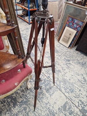 Lot 1256 - An interesting tripod base standard lamp.