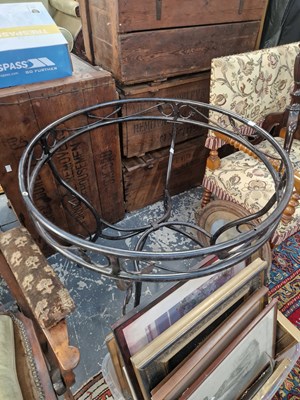 Lot 1273 - A wrought iron conservatory table.
