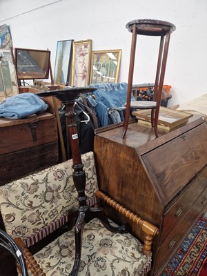 Lot 1275 - An antique mahogany tripod base plant stand...
