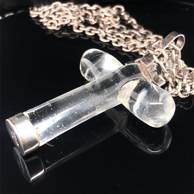 Lot 122 - Gucci. A vintage large glass cross with a...