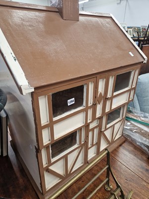 Lot 1294 - a large wooden dollshouse.