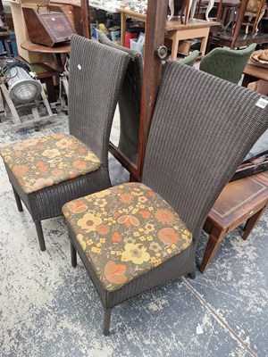 Lot 1300 - A pair of loom conservatory dining chairs.