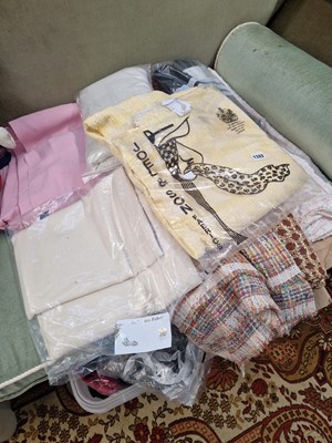 Lot 1322 - A collection of various dress making fabrics etc.