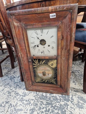 Lot 1339 - An American wall clock.