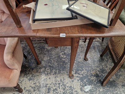 Lot 1344 - A small Georgian mahognay drop leaf table.
