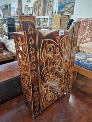 Lot 1365 - An art nouveau penwork decorated wall cabinet.