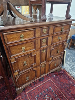 Lot 1372 - A 17th-century and later walnut chest of four...
