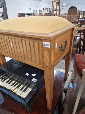 Lot 1389 - A sewing box stool.