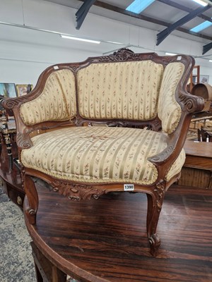 Lot 1390 - An Antique french style carved walnut show...