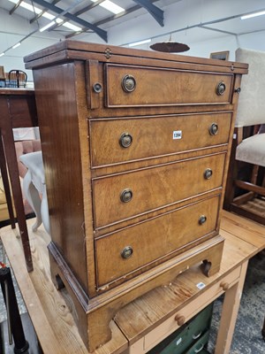 Lot 1394 - A Georgian style small bachelors chest.