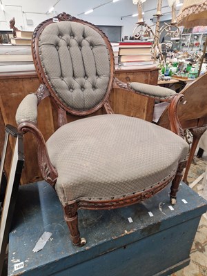 Lot 1402 - A 19th-century carved showframe salon armchair.