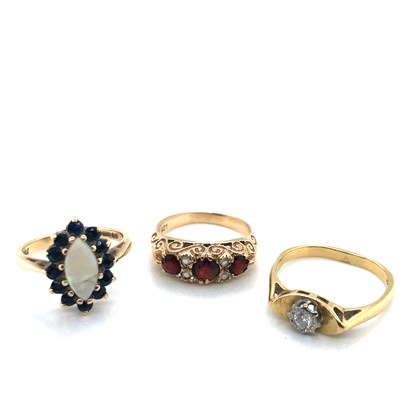 Lot 142 - A 9ct hallmarked opal and sapphire...