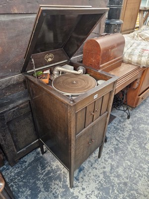 Lot 1410 - A Columbia oak cased floor standing gramophone.
