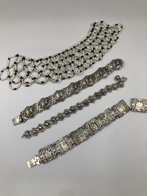 Lot 145 - A hallmarked Siam silver panel bracelet, a...