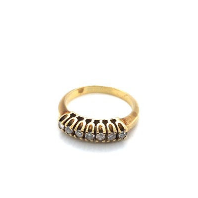 Lot 146 - A seven-stone diamond half eternity style ring,...