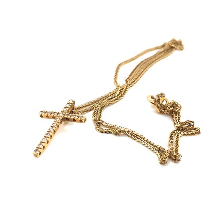 Lot 157 - An 18ct hallmarked gold diamond set cross and...