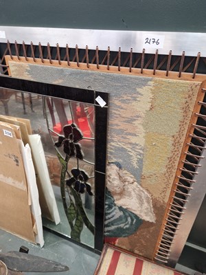Lot 2176 - A lead glazed stain glass mirror and sewn...
