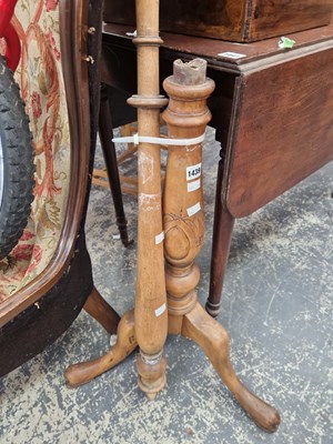 Lot 1439 - A tripod base wooden standard lamp