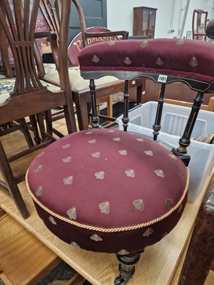 Lot 1451 - A Victorin ebonised small tub chair.