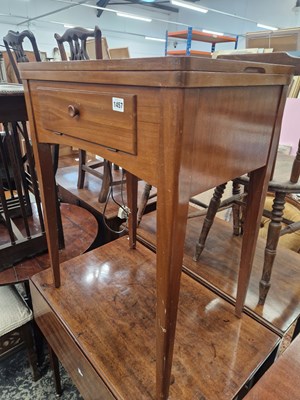 Lot 1457 - A sewing machine table with Singer machine.