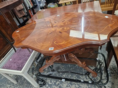 Lot 1467 - An inlaid coffee table.