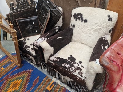 Lot 1482 - A pair of fur hide upholstered art deco armchairs
