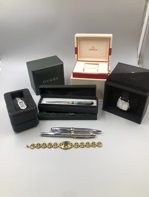 Lot 174 - A vintage Gucci watch reference number 6400L ...
