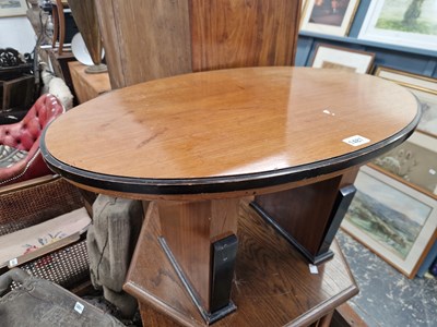 Lot 1487 - An art deco oval coffee table. W 76 D 51 H 42 cm